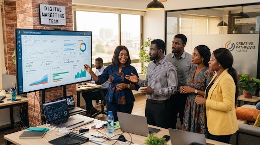 Black African digital marketing specialists analyzing growth metrics